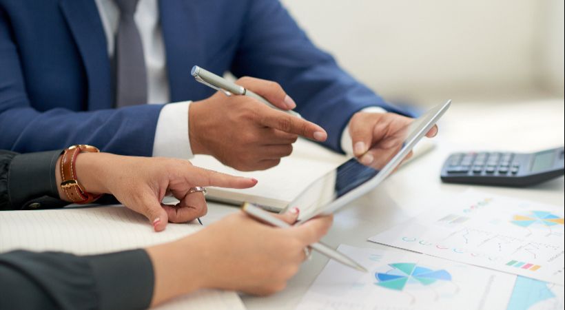 Someone working with their accountant to ensure compliancy 