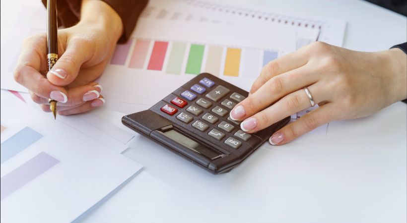 Someone working out their VAT