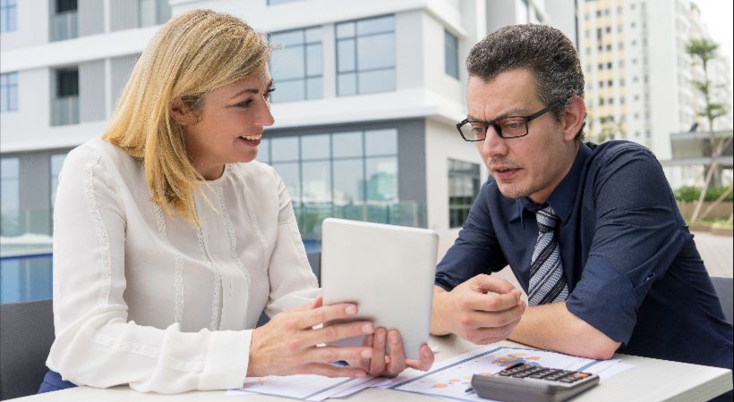 Someone meeting with their accountant to discuss finances