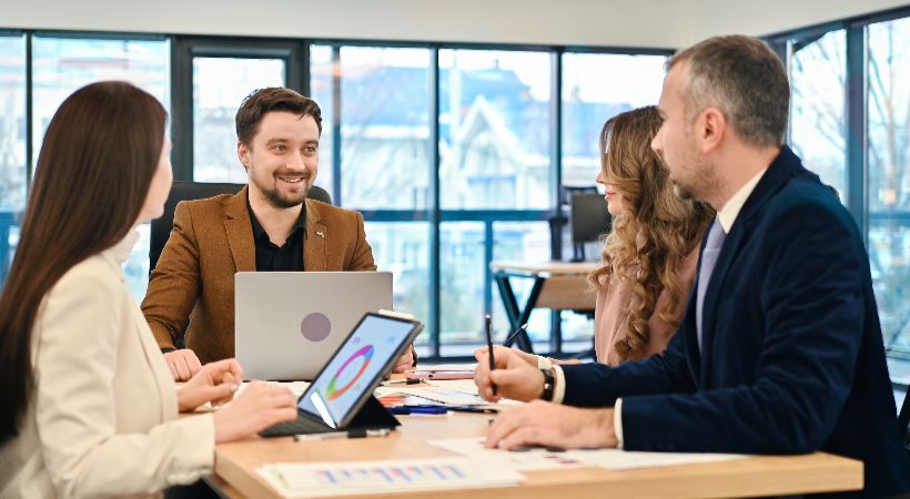 A business meeting with its team
