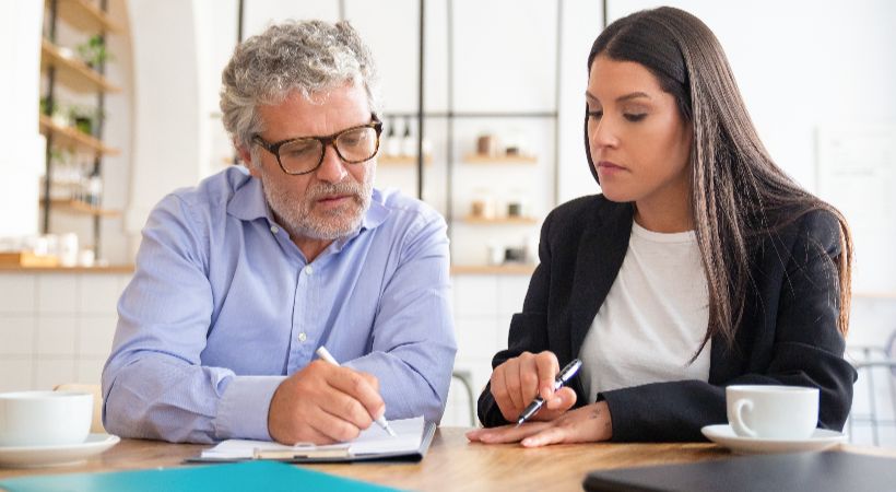 Someone meeting with an account on quarterly management