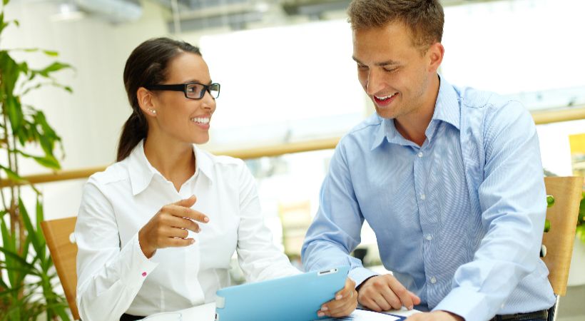 Business discussing quarterly accounts with accountant 