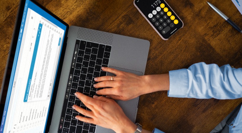 Person working on VAT calculations