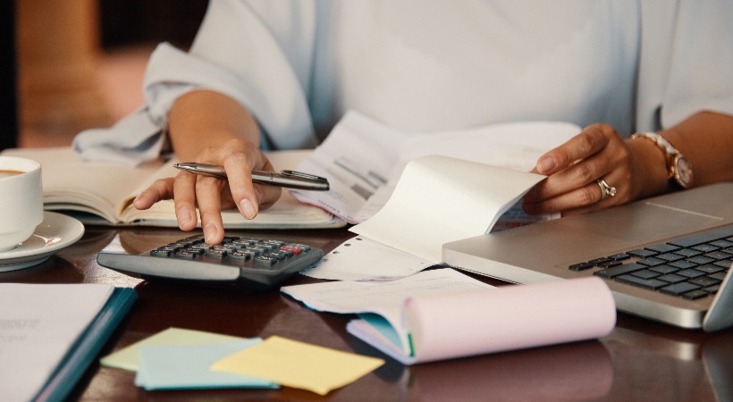 Person working on VAT calculations