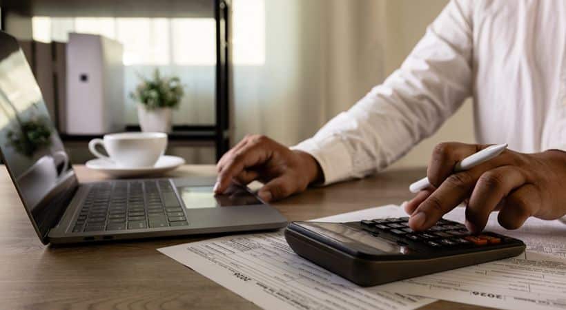 Accountant with tax forms