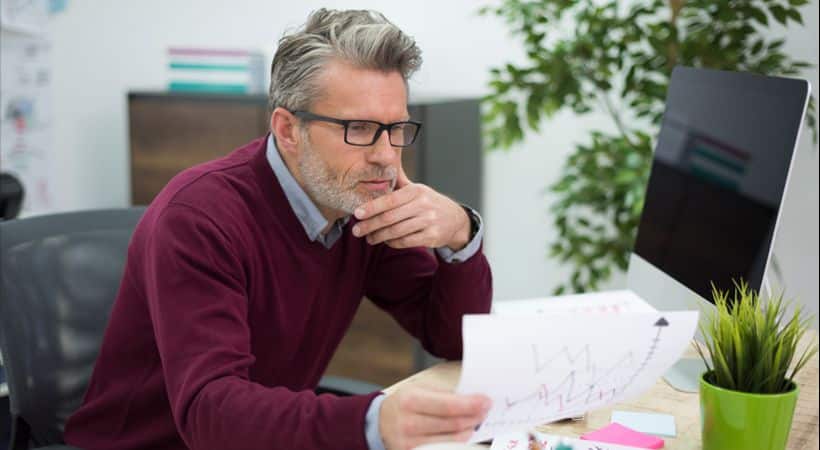 Man working on tax documents